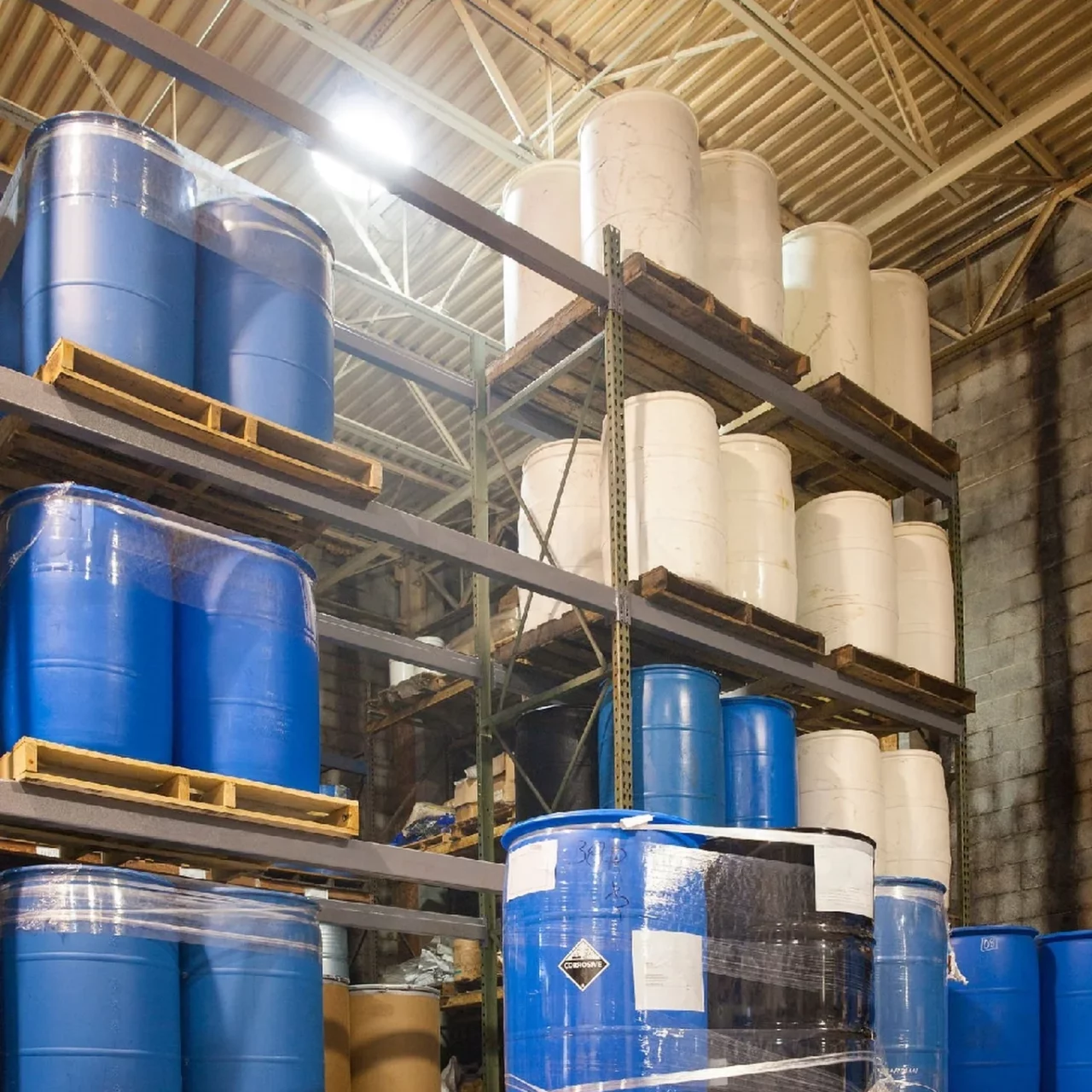 drums stacked on each other in the warehouse