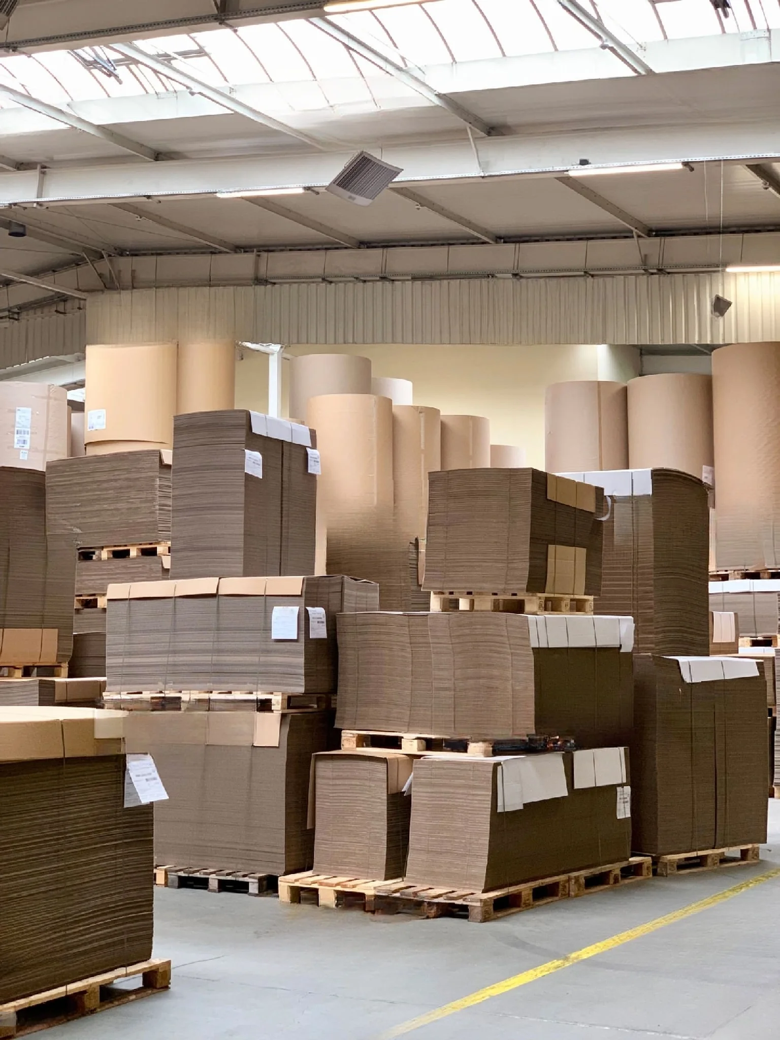 xetgo_capabilities_paper_packaging_5 paper-based raw materials stacked up in the warehouse before production